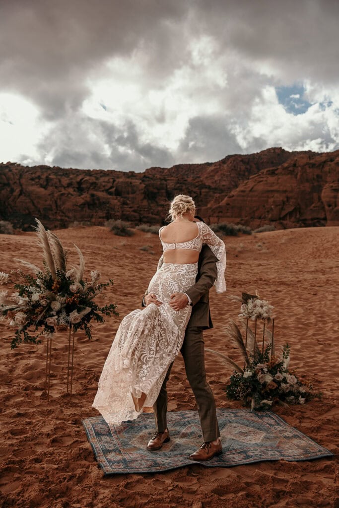 Jason spins Skyler around during their elopement.