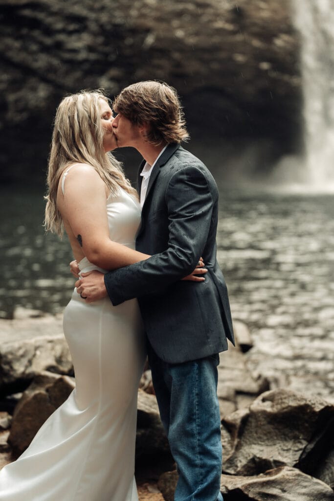 Brent & Ashlyn kiss in front of Foster Falls.