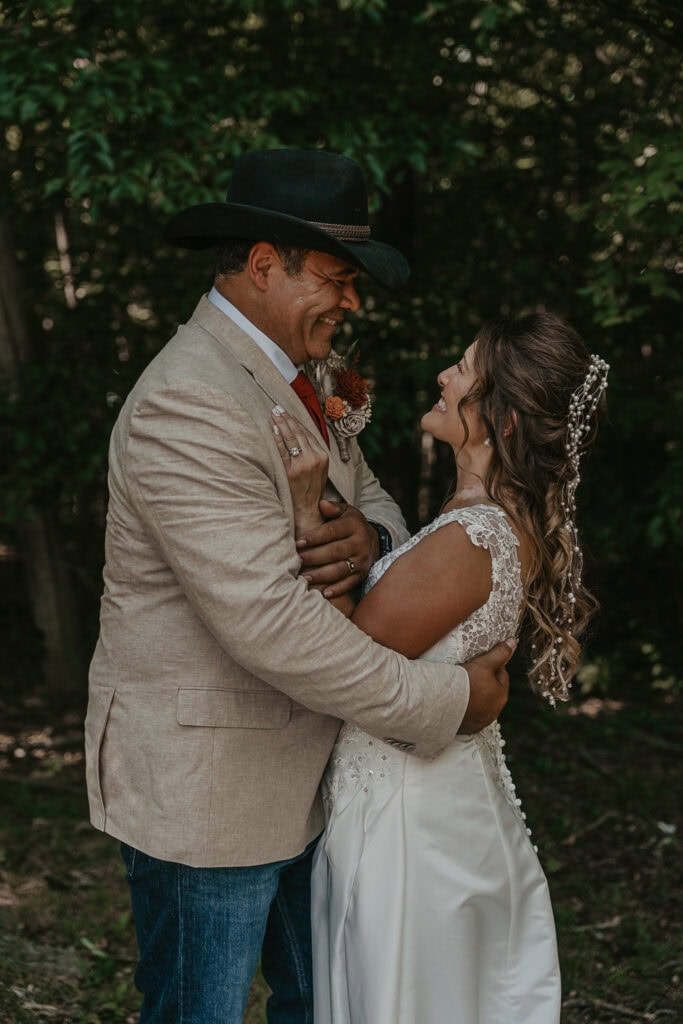 Anita and John look at each other happily right after their wedding ceremony.