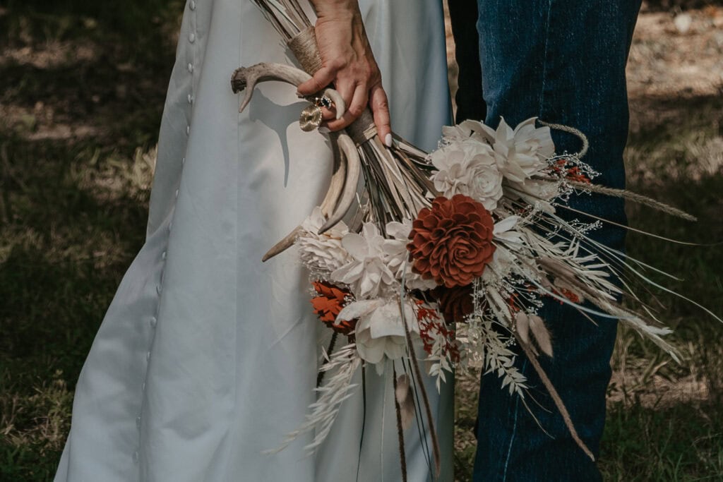 A bridal bouquet made out of sola wood flowers.