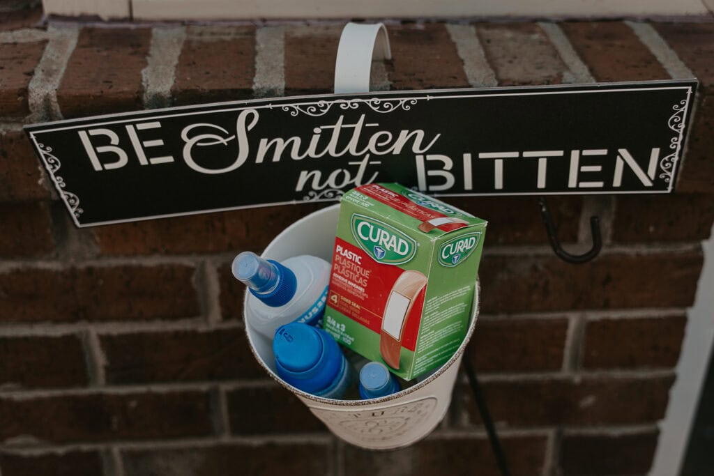 Big spray at an outdoor wedding with a sign, 