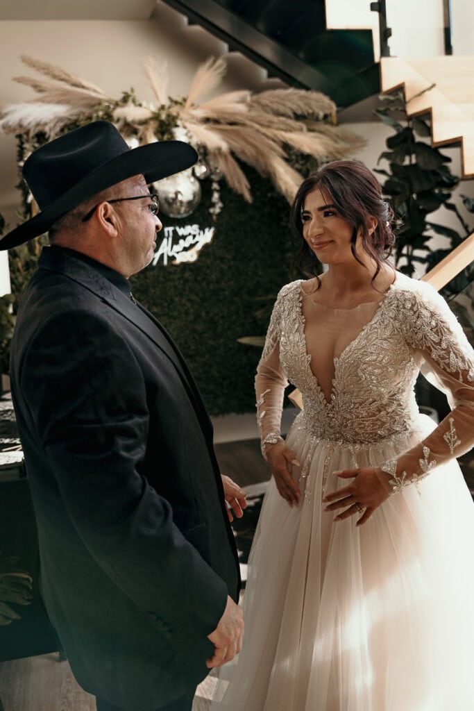 Amaris and her dad have a first look on her wedding day.